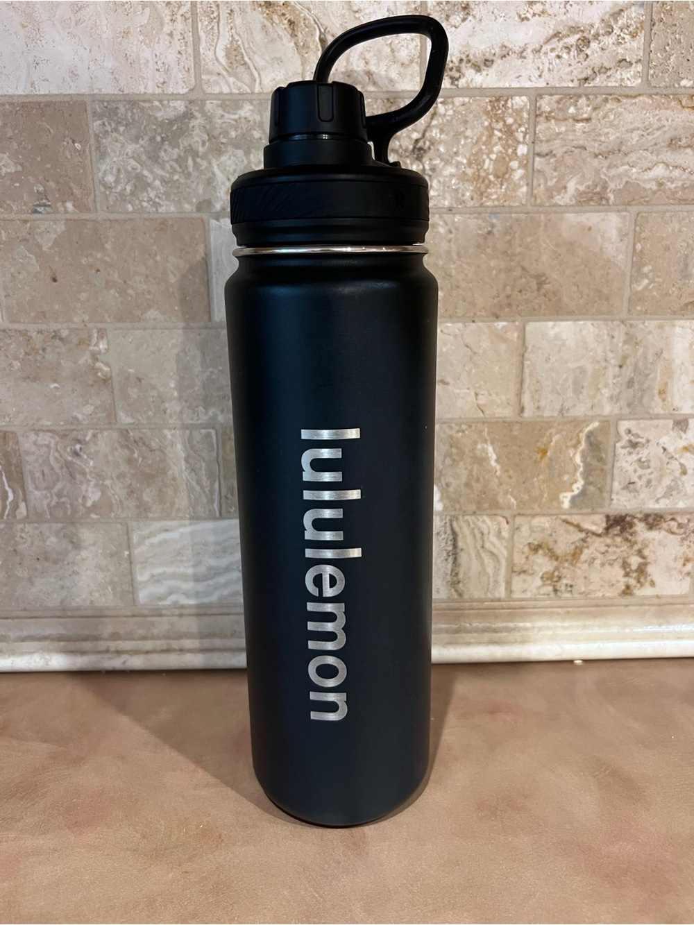 Lululemon Black & Stainless Steel Spouted Water Bottle; 24 ounces